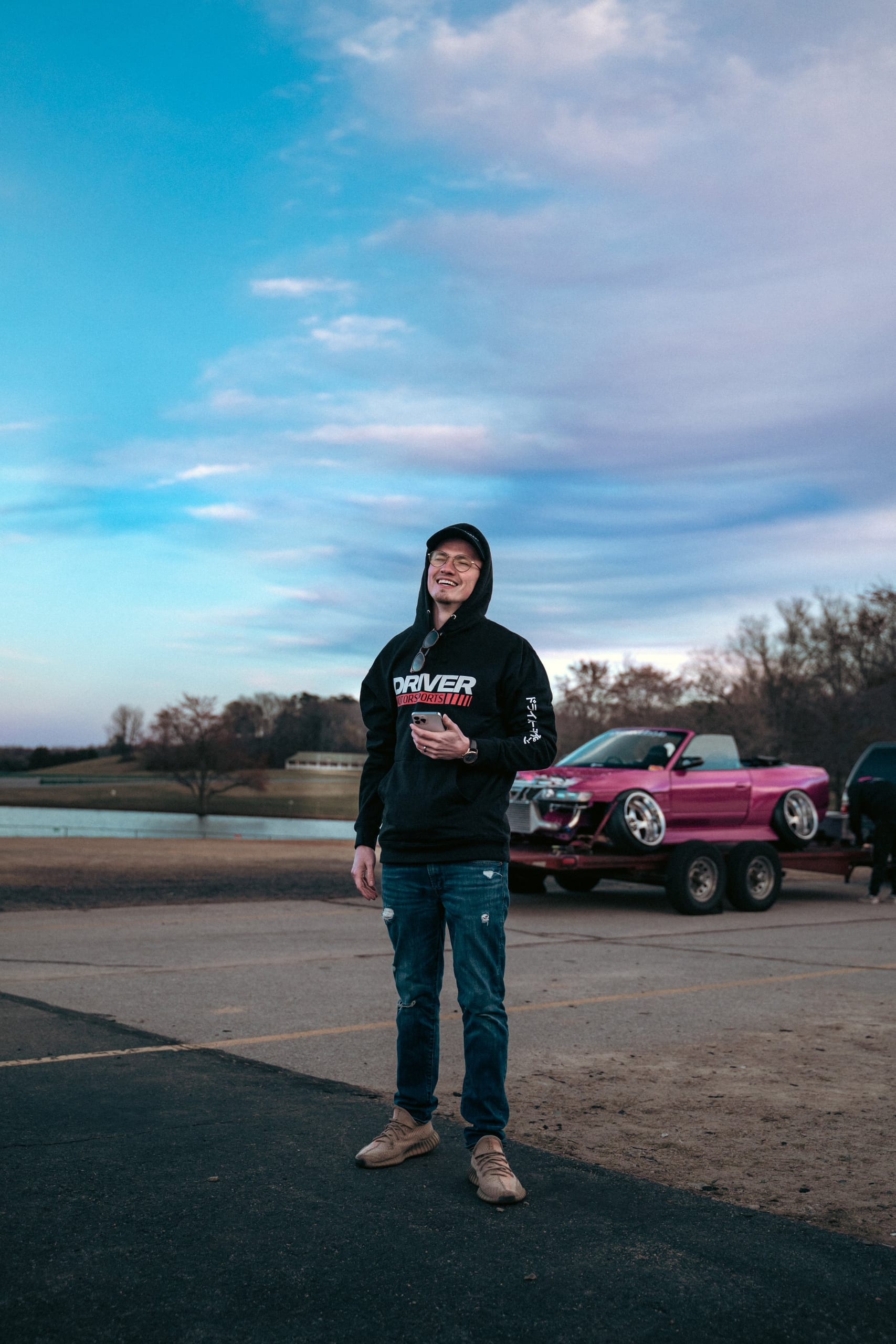 Driver Motorsports team member smiling at a community event