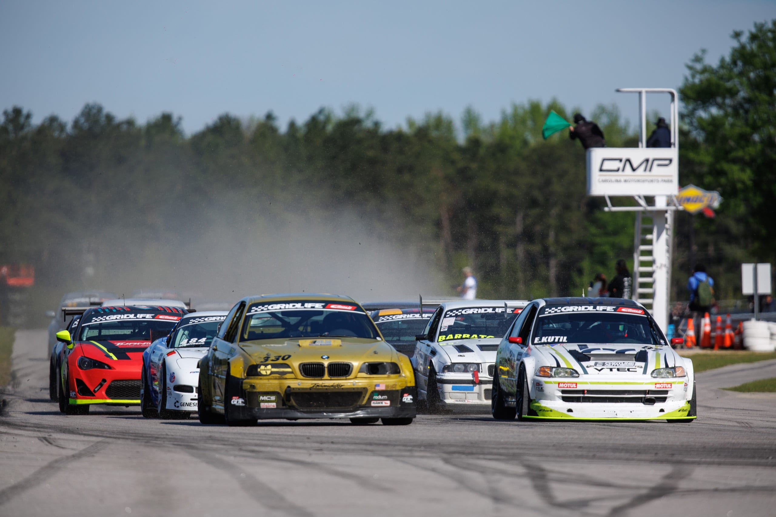 GRIDLIFE field launching from a green-flag start at Carolina Motorsports Park