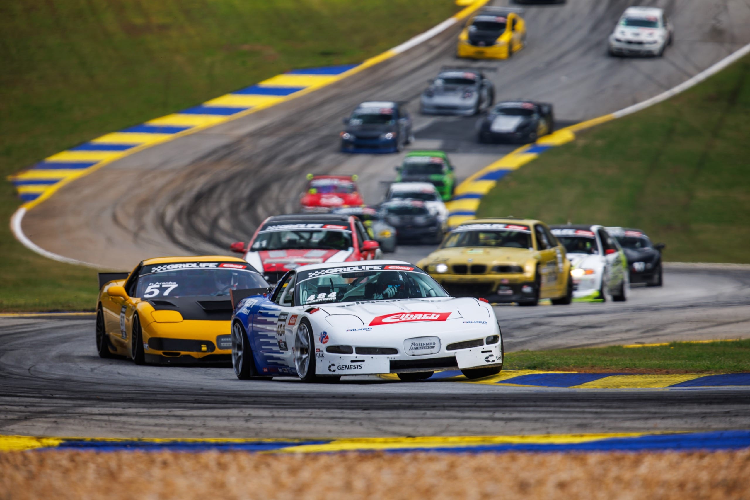 GRIDLIFE race cars stacked through the esses during an on-track session