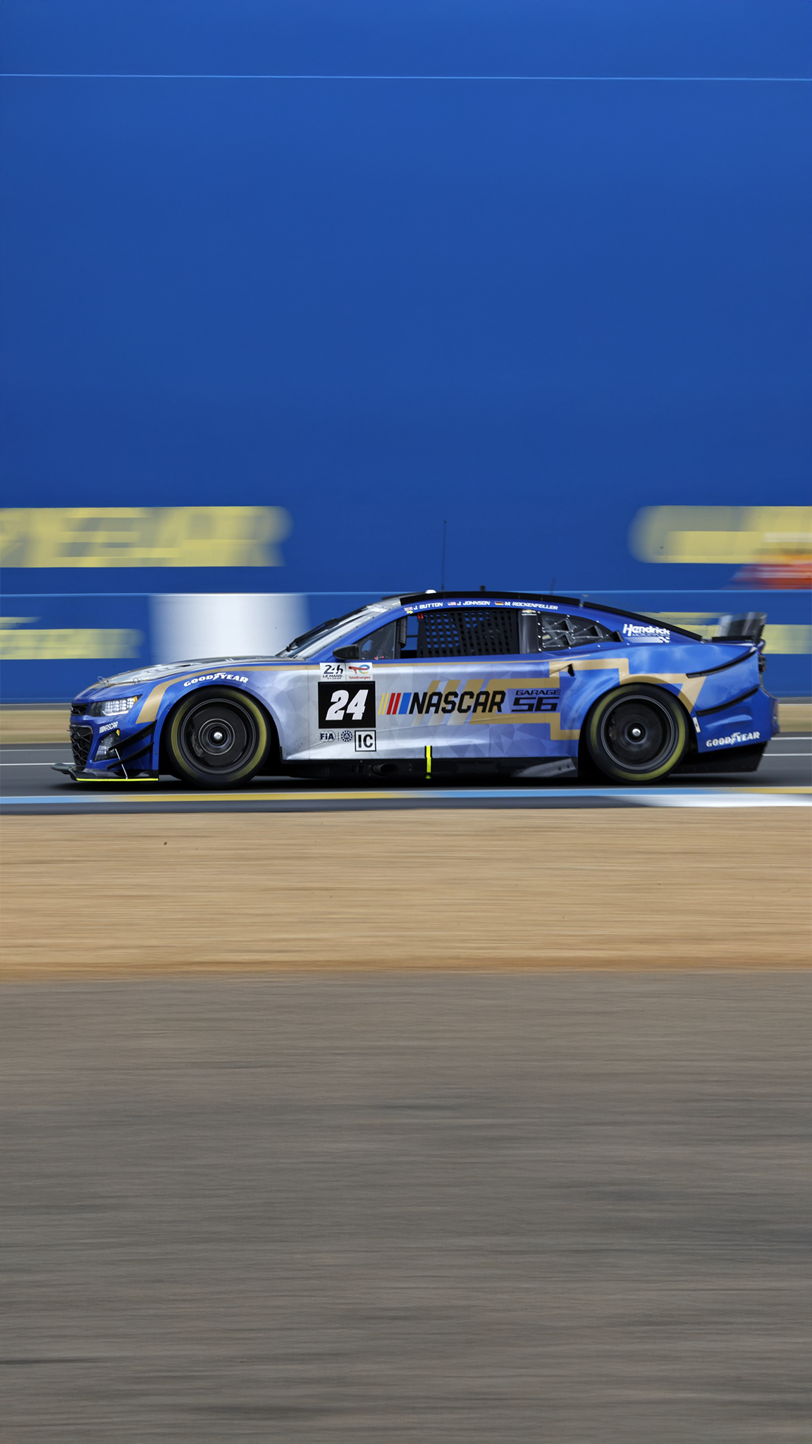 NASCAR Garage 56 car in profile against deep blue backdrop at speed