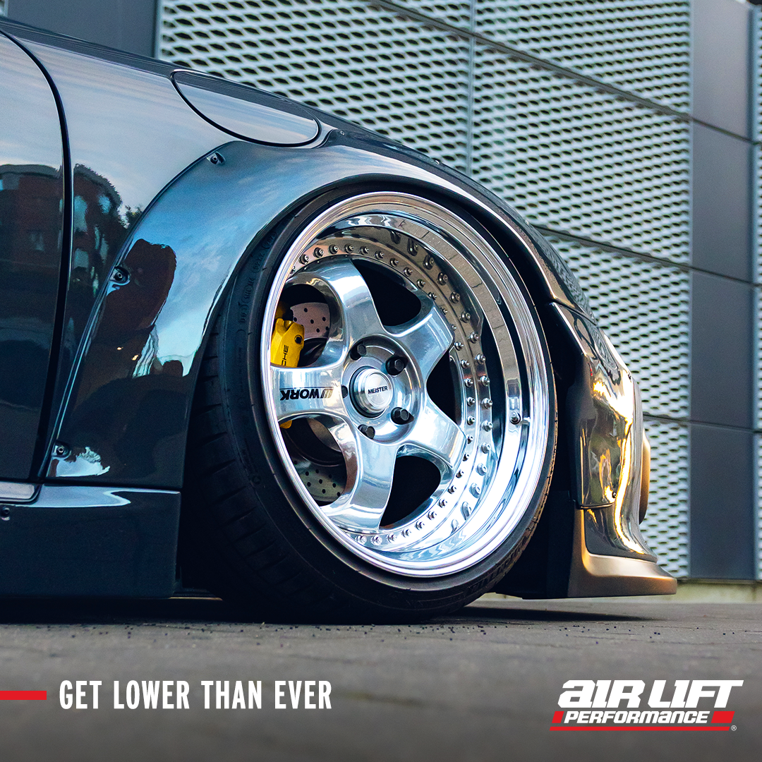 Air Lift Performance carousel ad: get lower than ever, slammed car on polished Work wheels