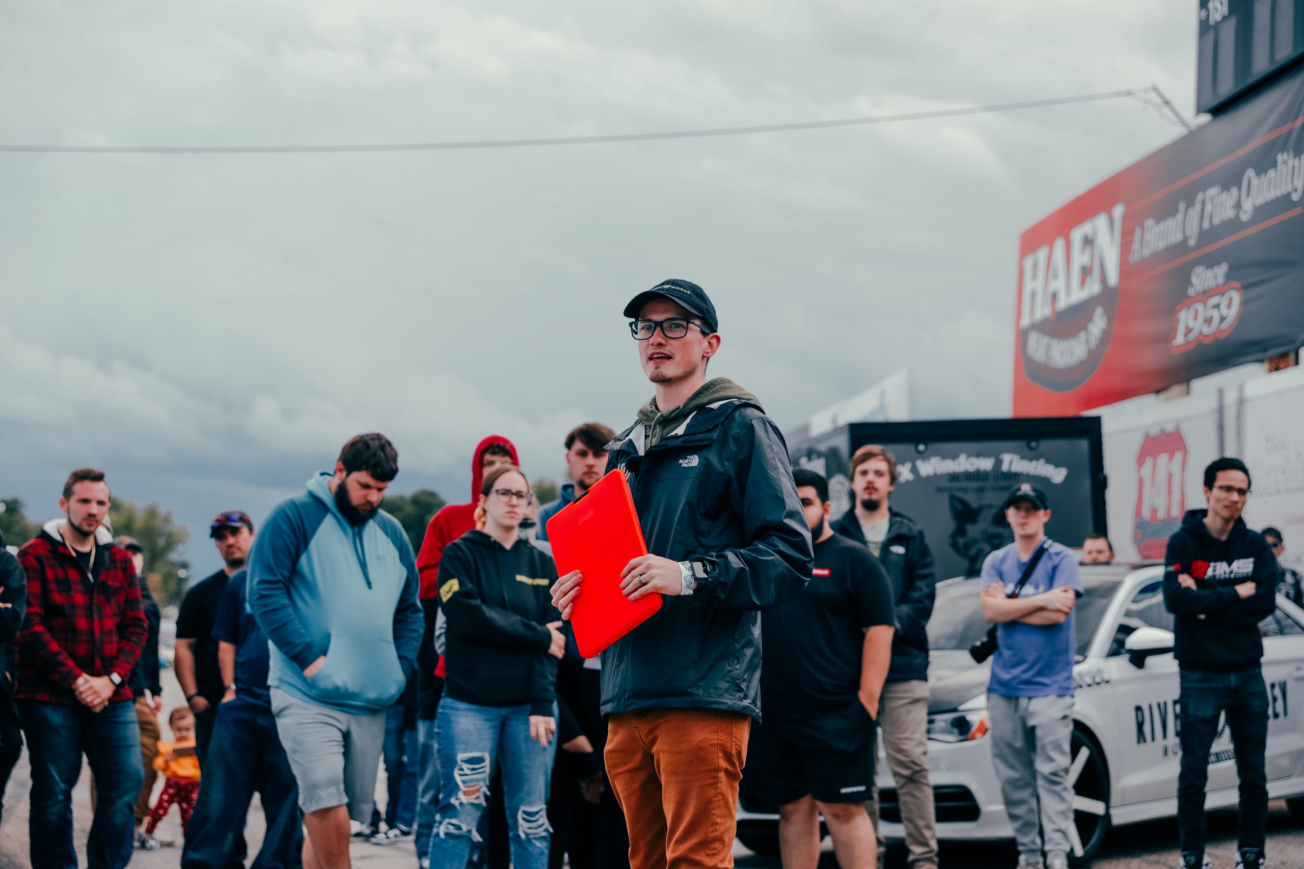 MetaMartini's Alex Martinez leading a briefing with a group gathered around him at an event